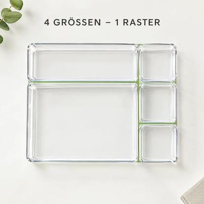 Ordnungsboxen in verschiedenen Größen ergeben zusammen ein lückenloses Raster