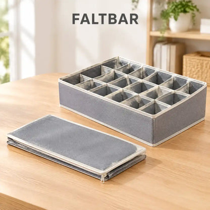 Faltbarer Schubladen Organizer flach zusammengelegt neben einer aufgestellten Box